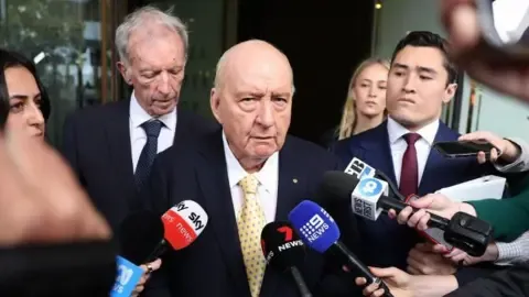 Indecent Assault Charges Involving Leading Down Under Broadcaster Reduced
